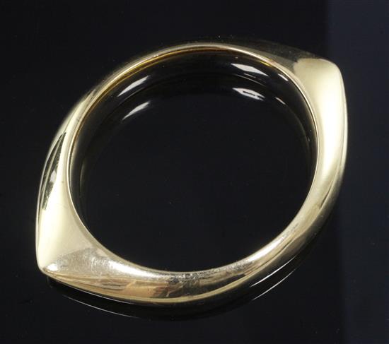 A Georg Jensen 18ct gold bangle, designed by Nanna & Jorgen Ditzel, no.1111, 74 grams.